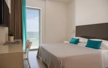 Superior face à la mer